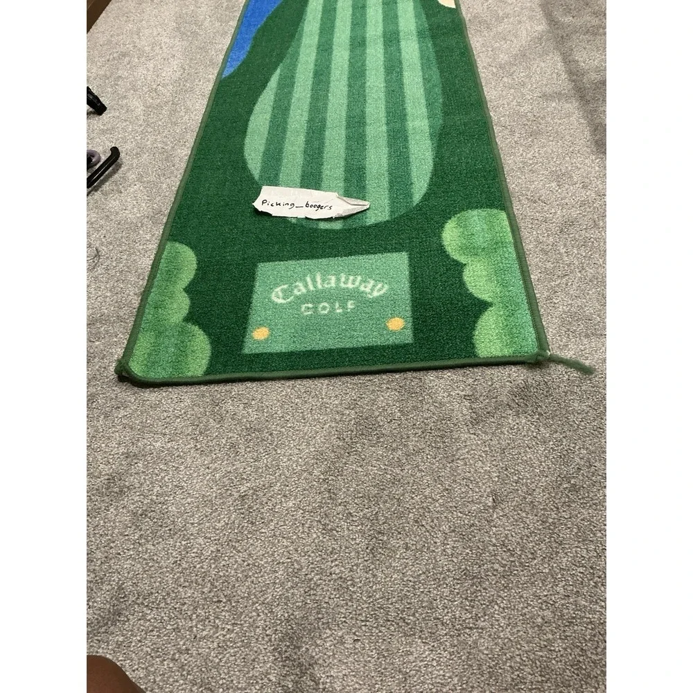 Callaway Golf branded putting mat, detailed fairway design with a putting green